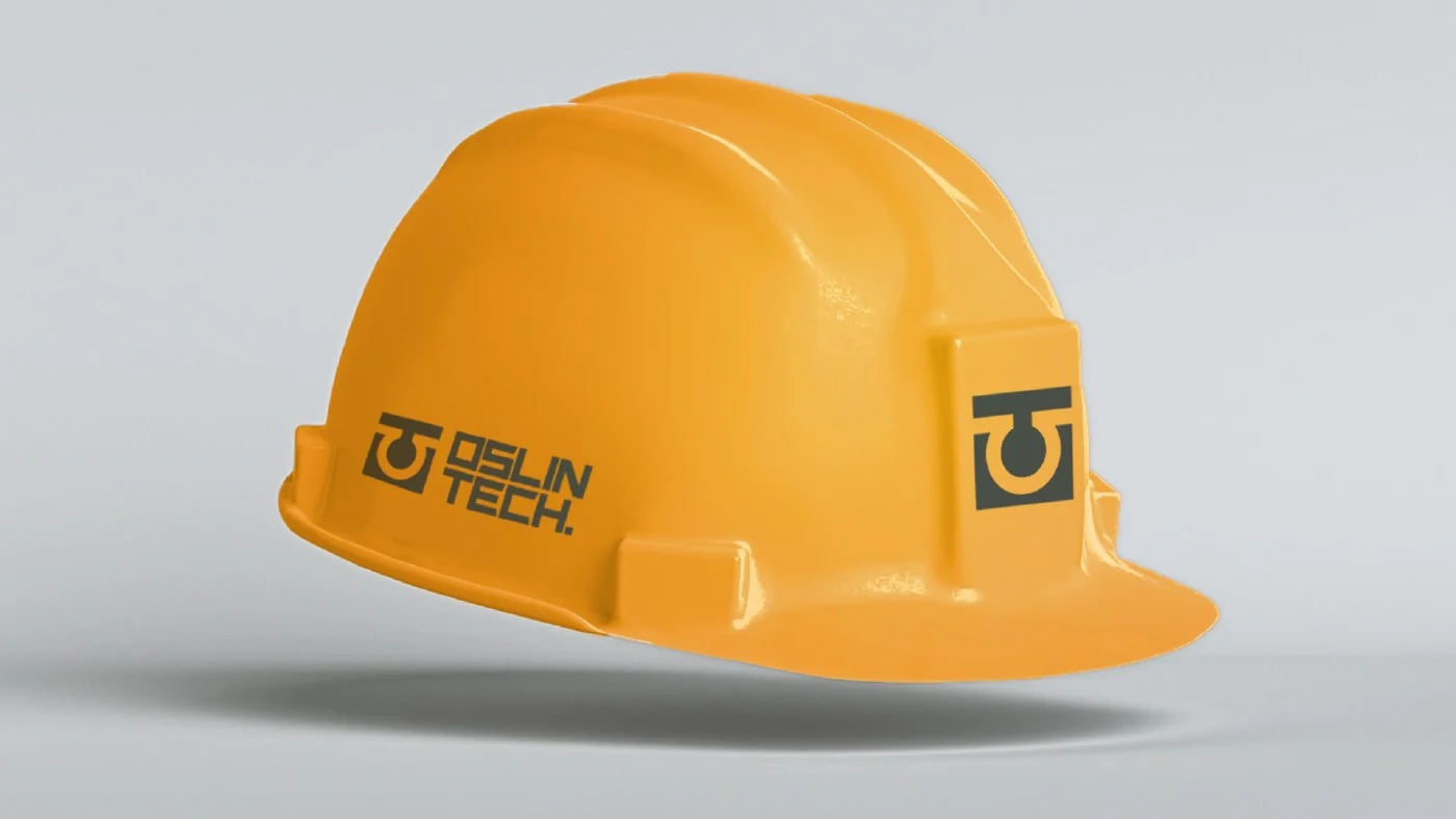 Oslin Tech brand application on a safety helmet